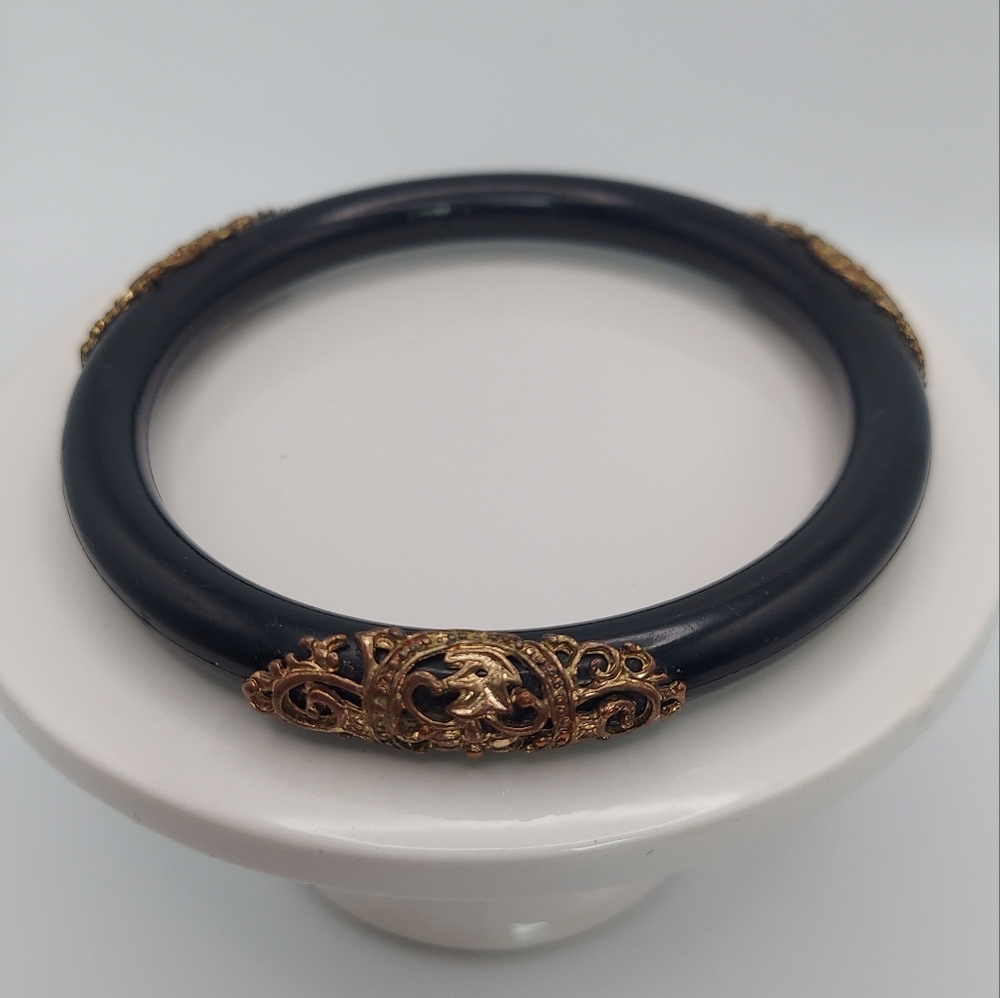 Vintage Black Acrylic Bangle Bracelet with Gold Decorations.